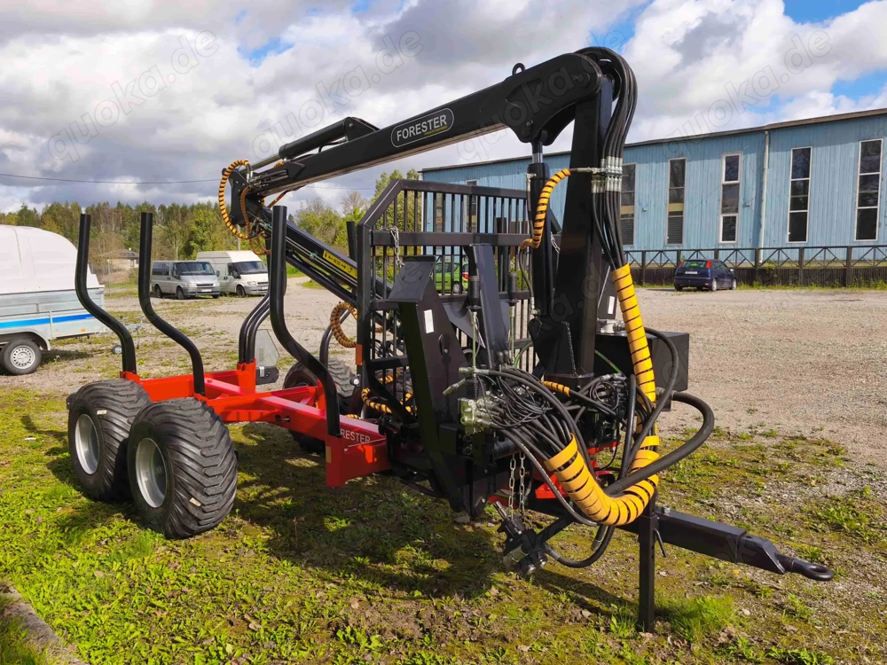 http://Forester%20FT-9%20meža%20piekabe%20ar%20FC-67L%20celtni%20un%20FG-20%20baļķu%20satvērēju%20attēls